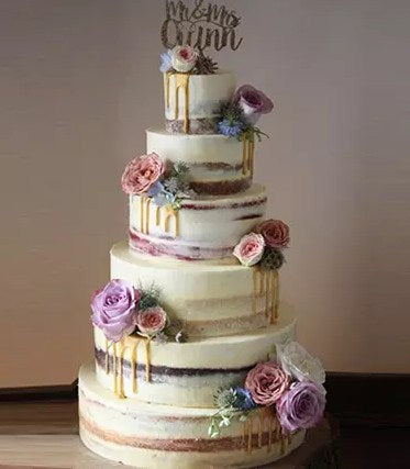 Beguiling 6 Tier Wedding Cake 14 Kg Vanilla Flavour